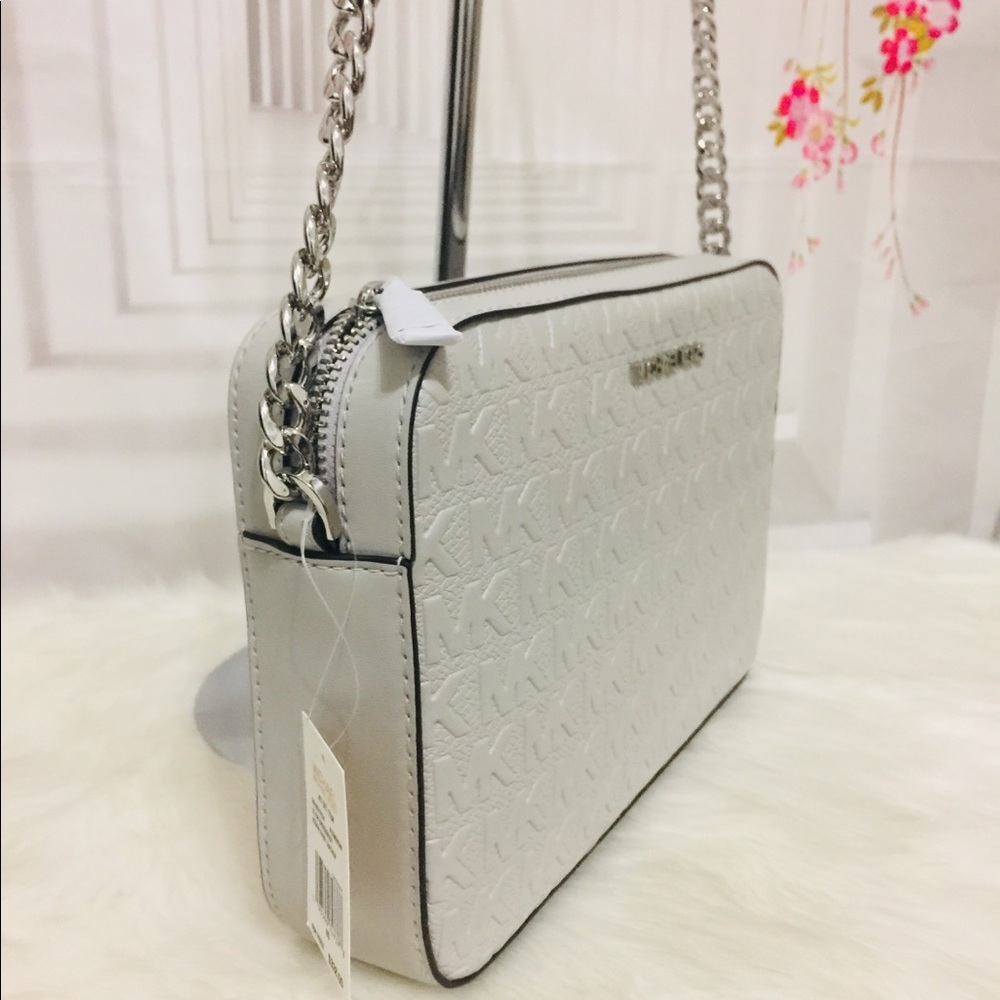 Michael Kors debossed leather Crossbody bag - Picture 4 of 11